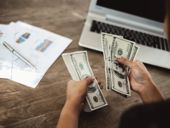woman calculating taxes